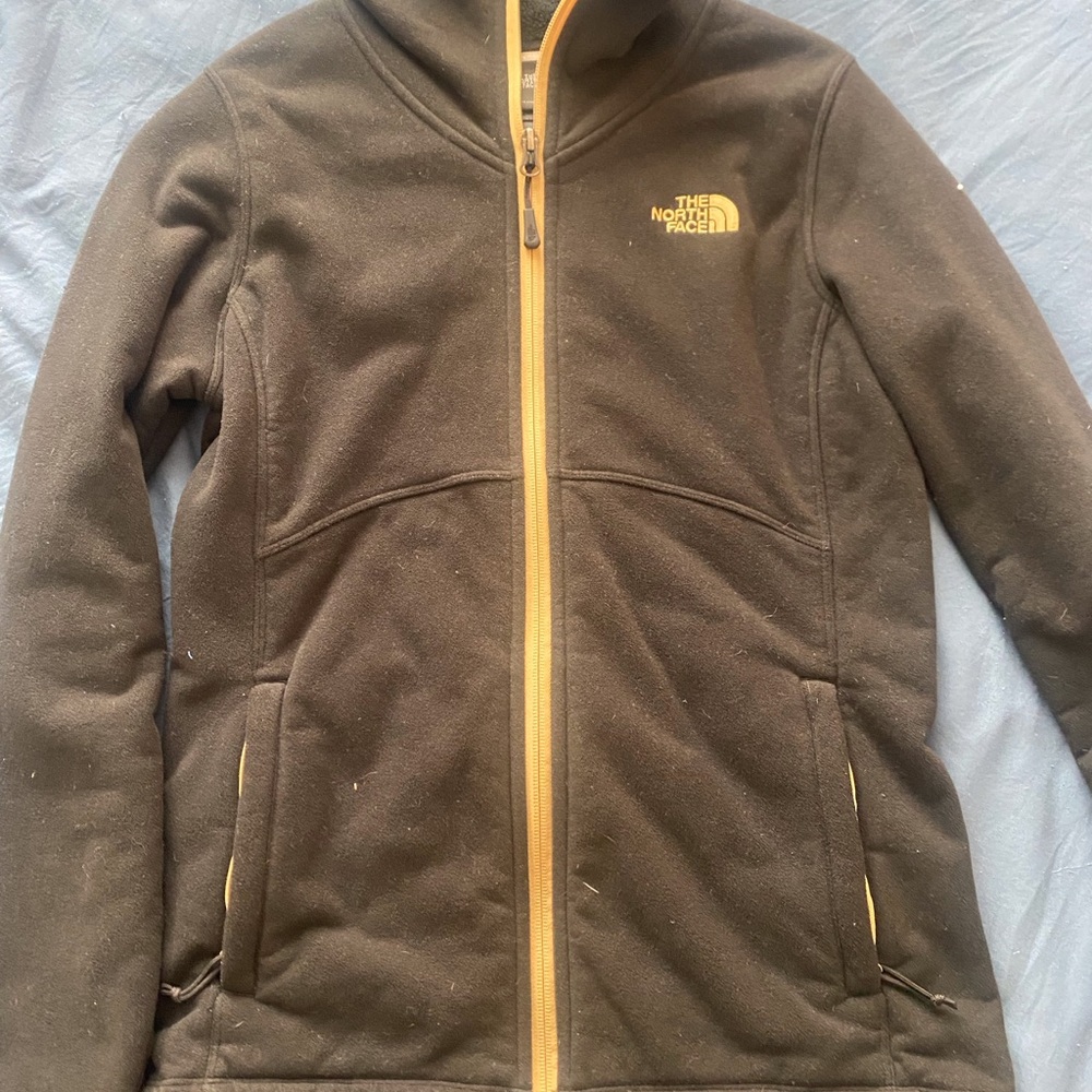 The North Face Black and Gold Ski Jacket with Fleece Lining